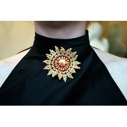 Broche soleil Swarovski - chic et sophistiqué