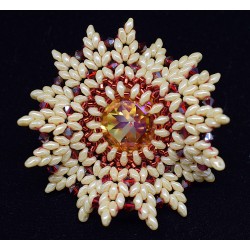 Broche soleil Swarovski - chic et sophistiqué