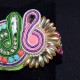 Bracelet en simili daim clouté et soutache