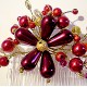 Peigne à chignon fleurs bordeaux rouges et fils dorés