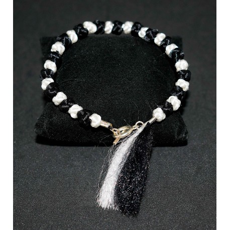 Bracelet en noeuds chinois boules et pompon